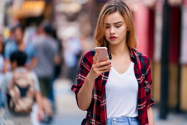 istock Tourist checking her phone 818532360