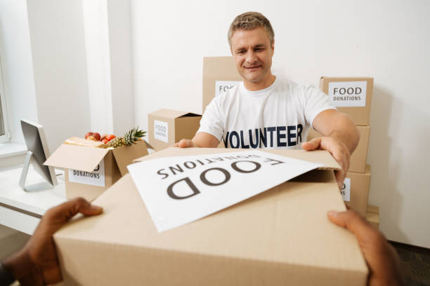 istock Kind enthusiastic gentleman grateful for donations 818588524