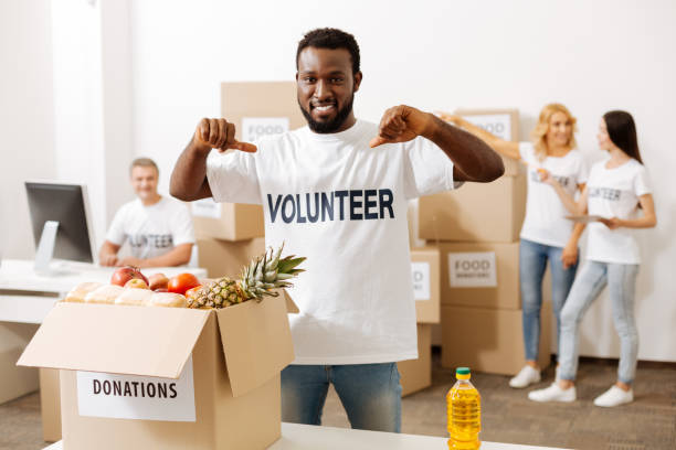 istock Nice passionate guy proud working for charity fund 818592952