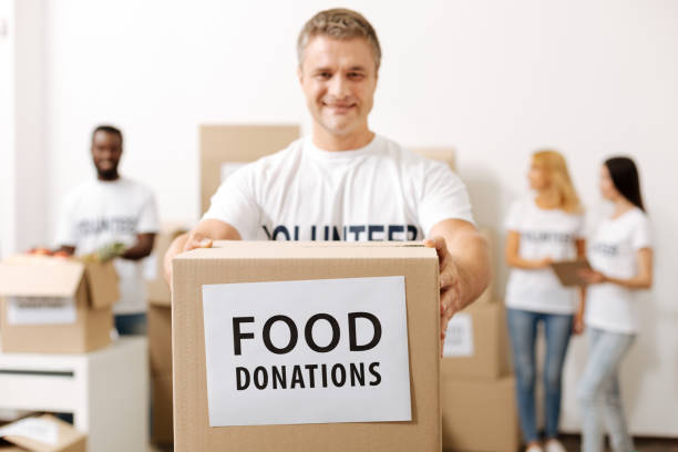 istock Nice diligent gentleman collecting food supplies 818593896