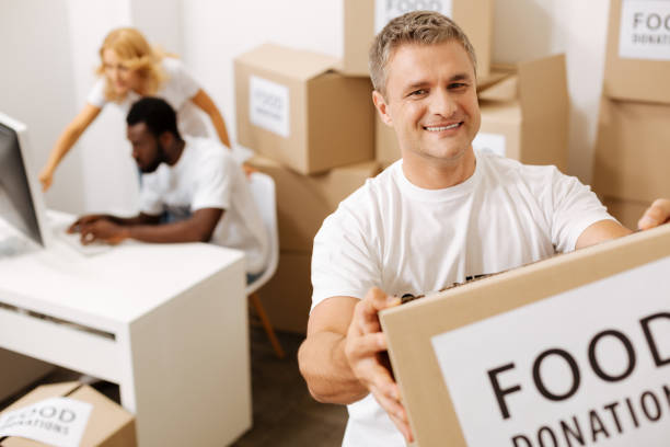 istock Altruistic admirable gentleman involved in charity 818597168