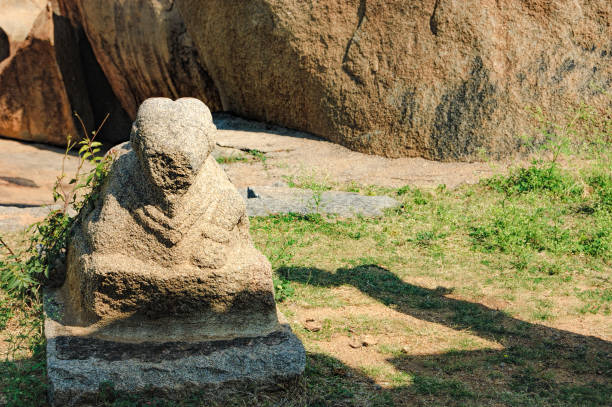 istock An ancient statue of a lion in Hampi, India 818643268