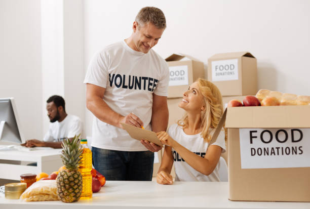 istock Observant woman pointing out something to her colleague 818651316