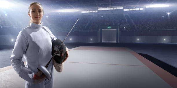 istock Female fencer on the big professional stage 818651754