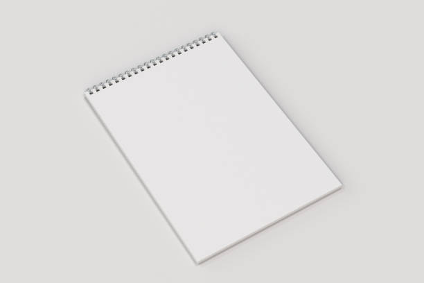 istock Blank white notebook with metal spiral bound on white background 818680972