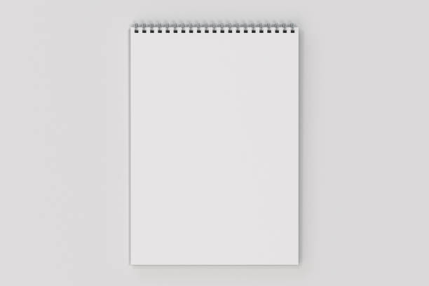 istock Blank white notebook with metal spiral bound on white background 818681454