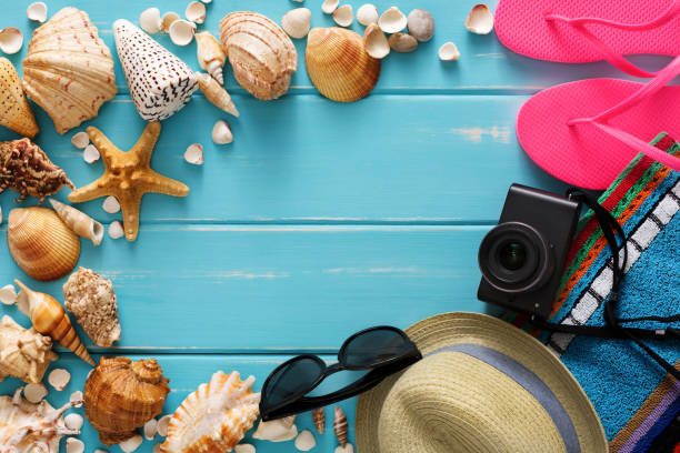 istock Vacation background on blue wood, top view with copy space 818688596