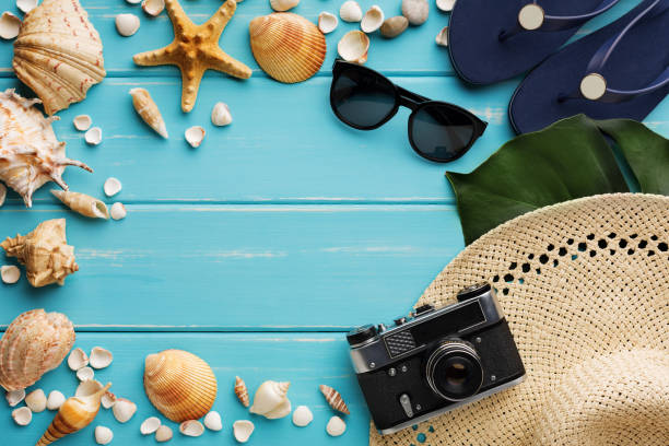istock Vacation background on blue wood, top view with copy space 818688918
