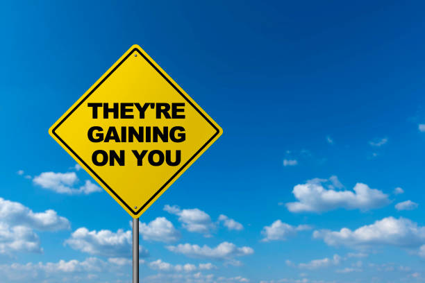 istock THEY'RE GAINING ON YOU - Road Warning Sign 818725606
