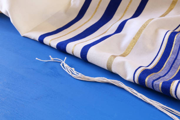 istock White Prayer Shawl - Tallit, jewish religious symbol. 818746112