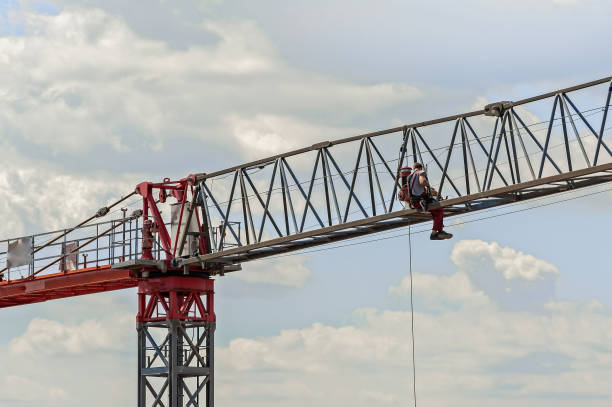 istock Electrician repairs an electric motor on a crane. 818766556