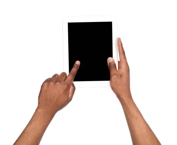 Photo of Holding and pointing to blank screen on tablet