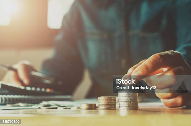 Saving Money Woman Hand Putting Coin Stack Concept Business Finance Stock Photo - Download Image Now