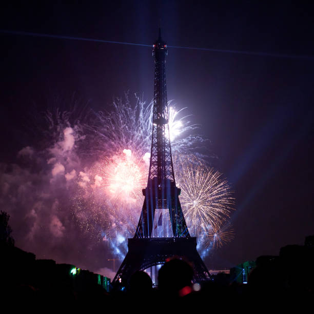 fireworks at National day of France night scene of  fireworks at Eiffel Tower in Bastille Day,  July 14, 2013 in Paris France bastille day photos stock pictures, royalty-free photos & images