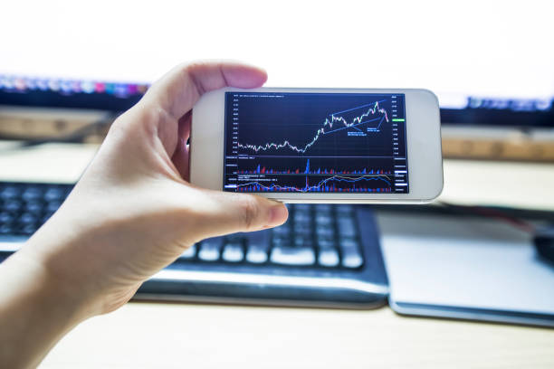 istock Stock market graph and office work 818823696