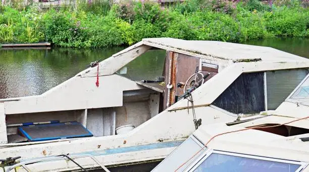 Sinking old wrecks of canal boats in disrepair