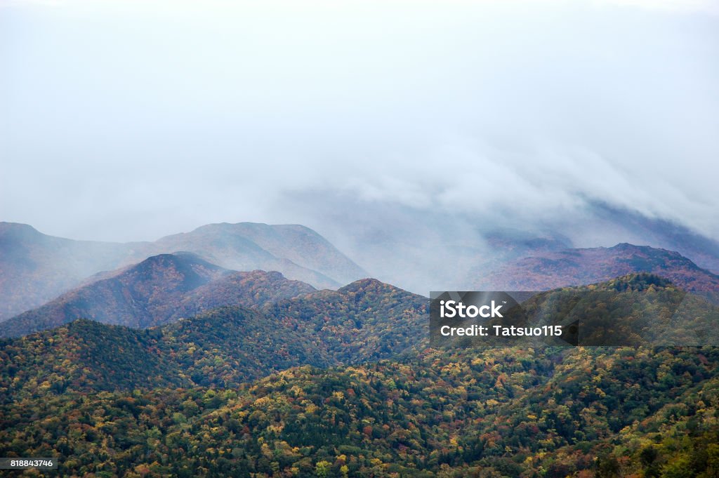 Shiretoko Mountains Covered in Clouds in Autumn, Eastern Hokkaido, Japan Autumn Stock Photo