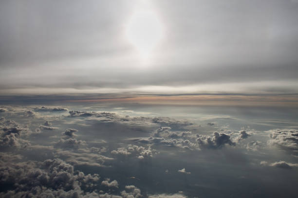 istock Clouds under the wing of an airplane 818851376