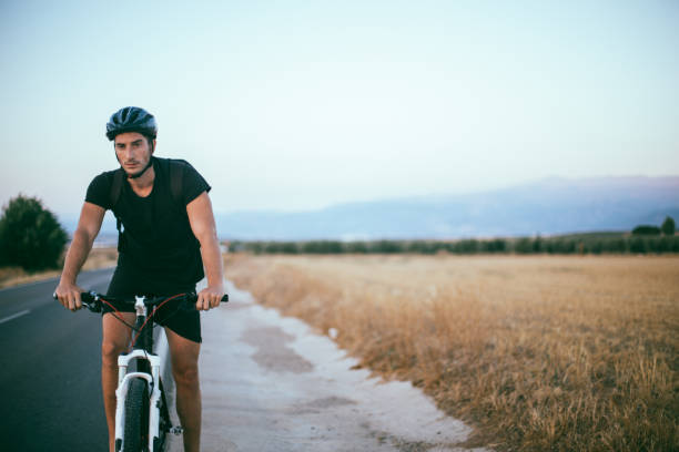 istock Athlete on mountain bike 818879410