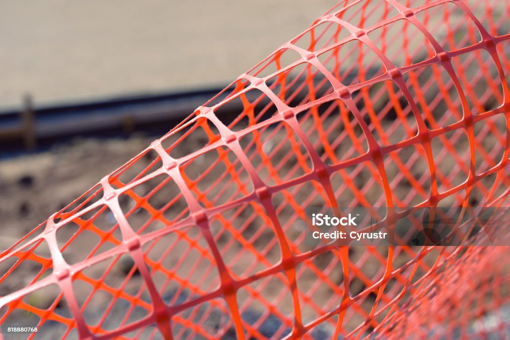 Plastic safety net for construction site. Construction mesh. Adhesive Tape Stock Photo