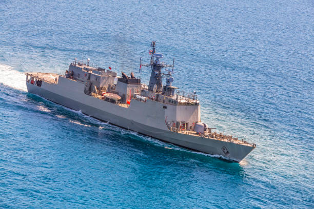 istock Grey modern warship sailing in the sea 818884532