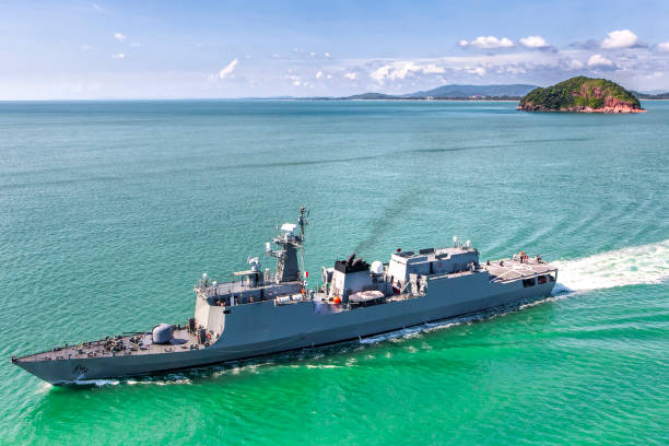 istock Grey modern warship sailing in the sea 818885240