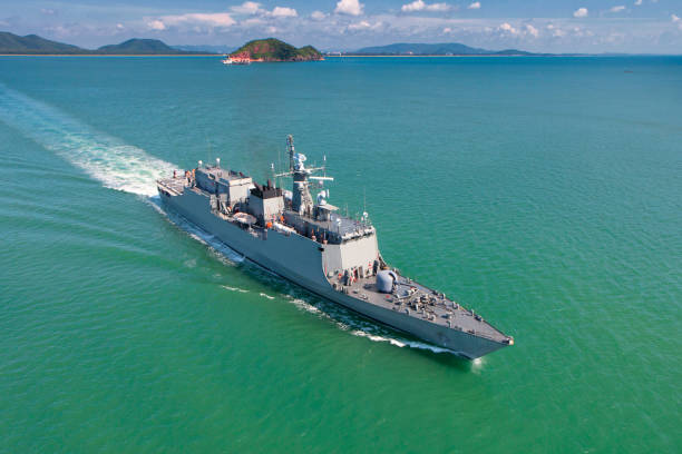 istock Grey modern warship sailing in the sea 818889042