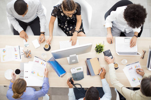 istock Businesspeople working in office 818899552