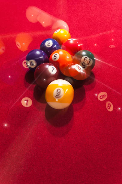 istock Nine ball billiards break in motion - stroboscopic 818908860
