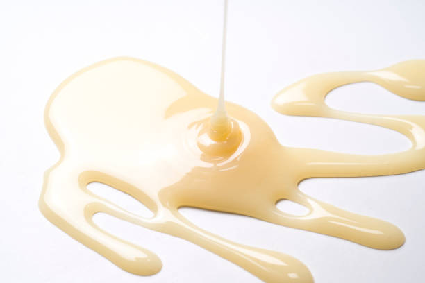 istock condensed milk isolated on a white background 818910716
