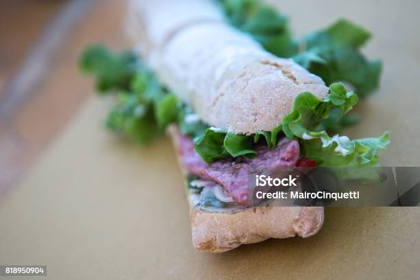 Giant Sandwich With Sausage Salad And Garlic Stock Photo - Download Image Now - Street Food, 2017, Audience