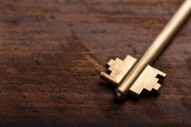 istock Modern key on a wooden background 818968826