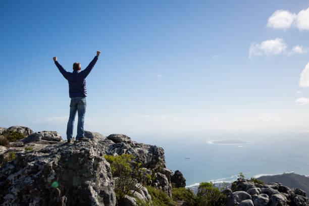 istock Male stands arms outstretched 818981088
