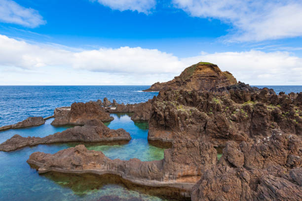 istock Natural lava rock swimming pools 819050300