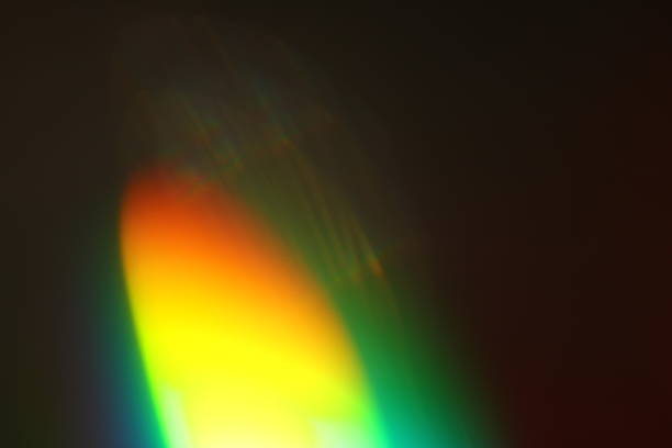 istock Abstract background - light color flashes and rays on black. Lens flare. For use as texture layer in your project. Add as 