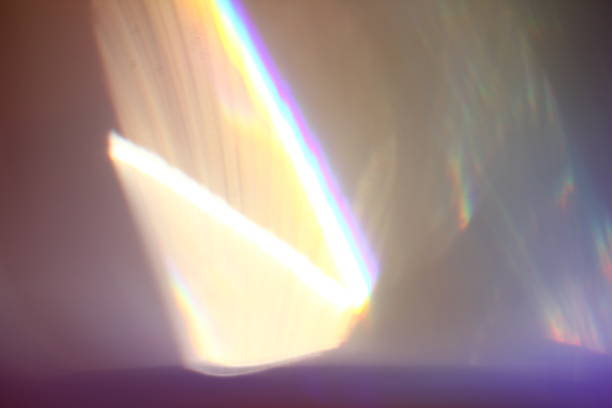 istock Abstract background - light color flashes and rays on black. Lens flare. For use as texture layer in your project. Add as 