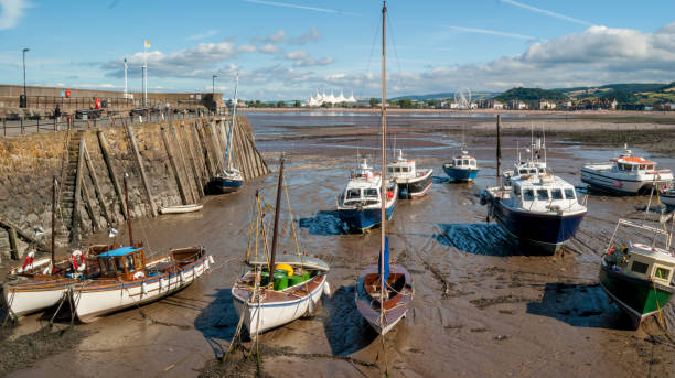 istock Boats at low tide in Minehead harboard,  Minehead, Somerset, UK. 819072660