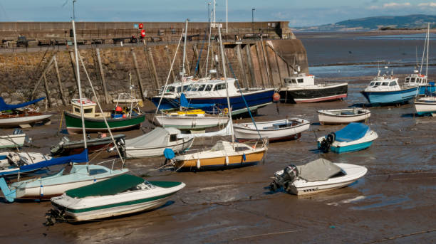 istock Boats at low tide in Minehead harboard,  Minehead, Somerset, UK. 819072716