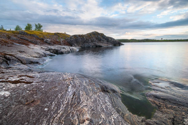 istock Lake stony coast landscape 819152382