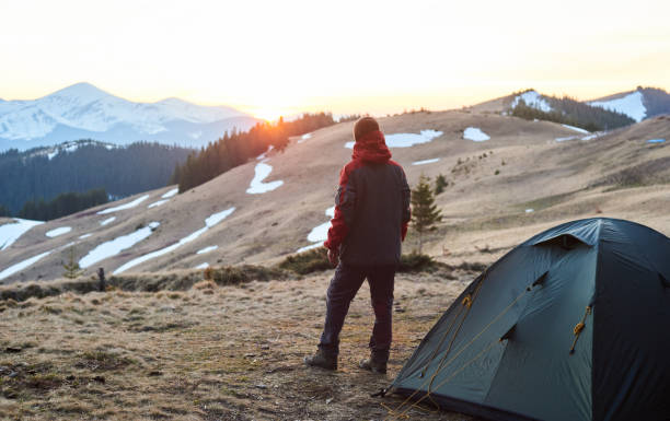 istock Man camping in the mountains 819167730