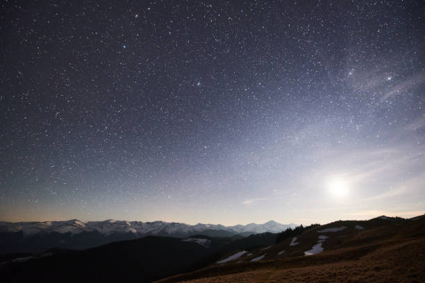 istock Beautiful night skies above mountains 819167766