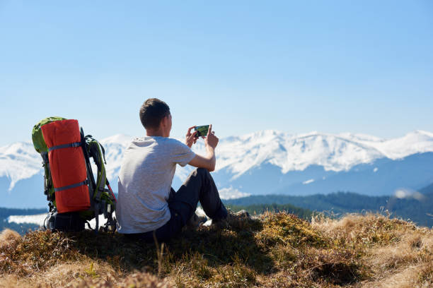 istock Male hiker with backpack in the mountains 819172122
