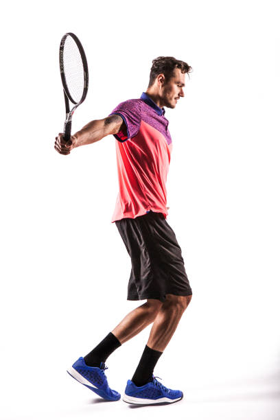 istock Young man  playing tennis 819189244