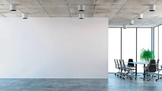 Empty office interior with conference table and decorative plant on concrete floor. White wall with copy space and windows in background. 3D rendered image.