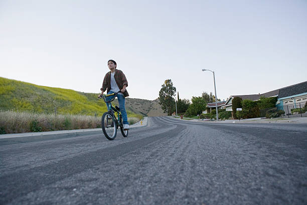 young boy riding bicycle  woodland hills los angeles stock pictures, royalty-free photos & images