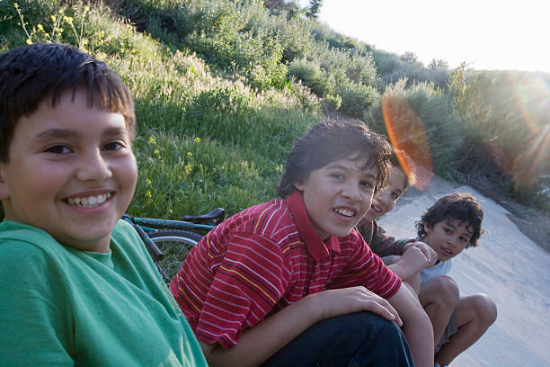 young boys hanging out near a drainage ditch  woodland hills los angeles stock pictures, royalty-free photos & images