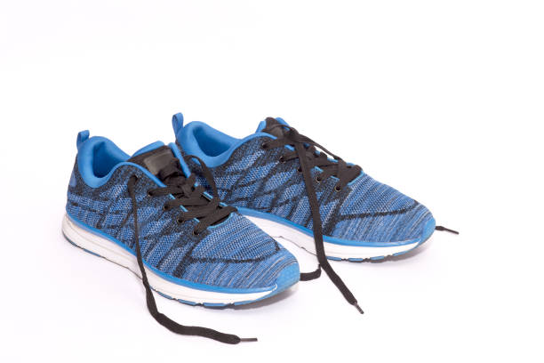 istock Blue Sport Shoes on White Background 819332120