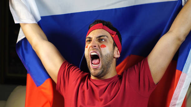 istock Russian Guy Waving Russia Flag 819382024