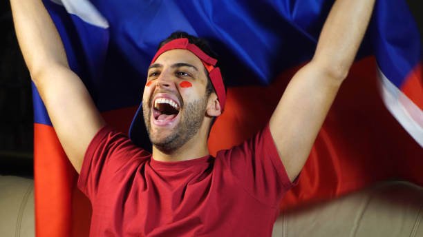 istock Russian Guy Waving Russia Flag 819382076