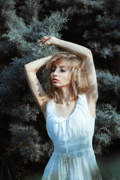 istock white lady in wood 819394294